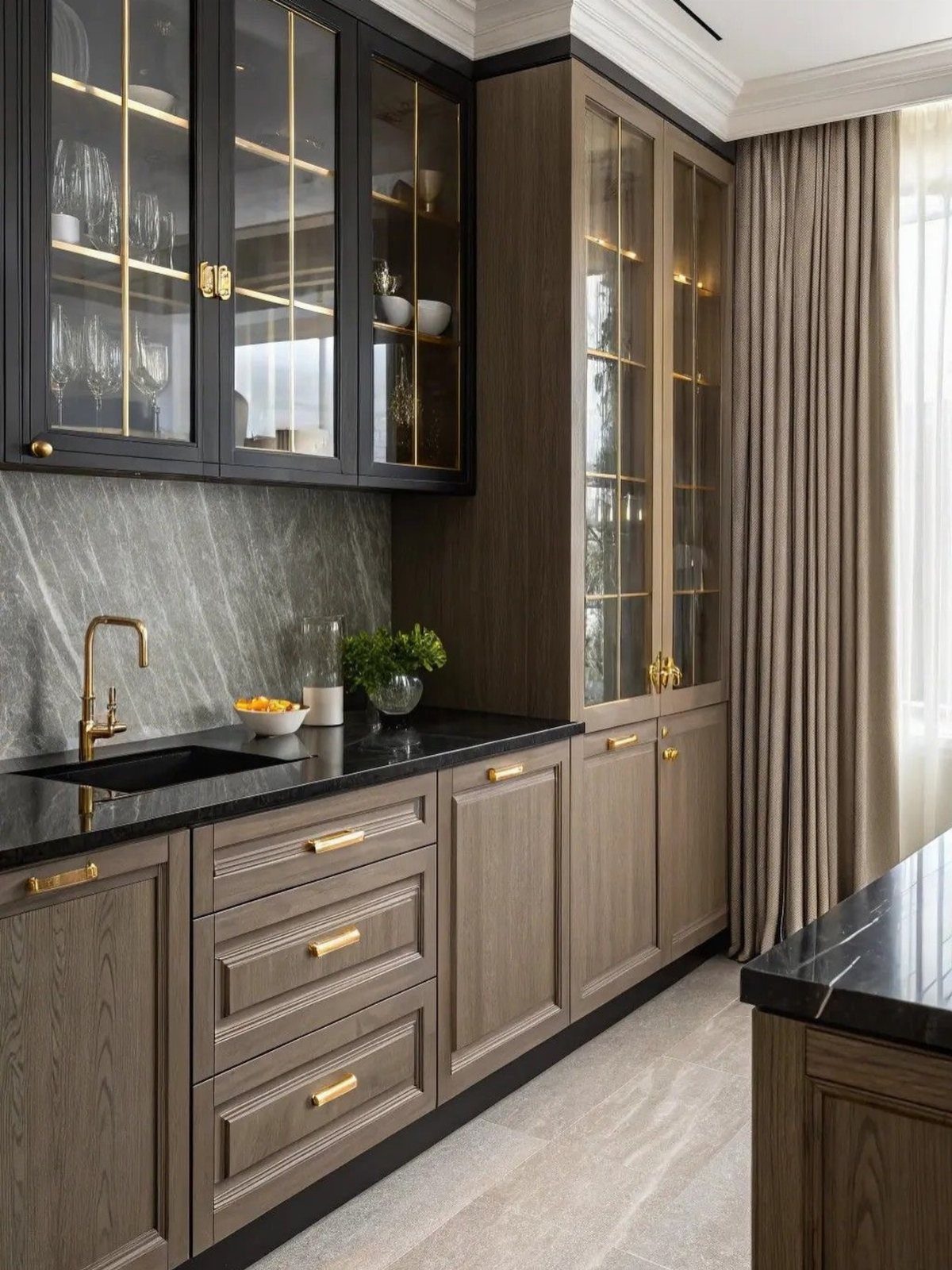 Kitchen with brown wood cabinets, black glass-front upper cabinets, and gold hardware.