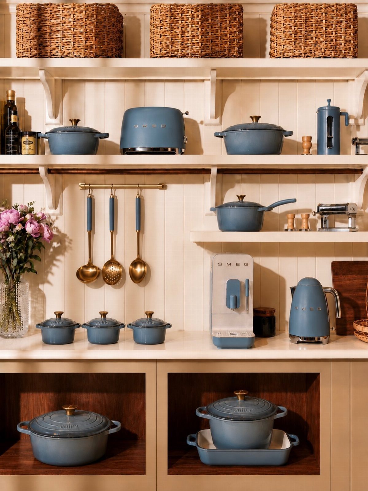 Blue Kitchen Appliances: 28 Ideas from Ranges to Kettles 19 Blue kitchen appliances and cookware arranged on white shelves in a bright kitchen.
