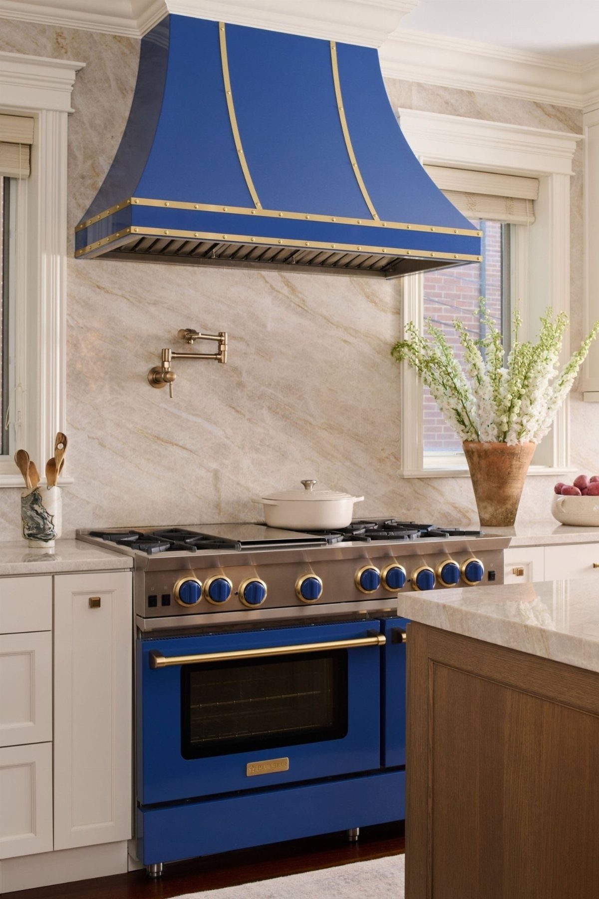 Blue Kitchen Appliances: 28 Ideas from Ranges to Kettles 22 Blue range oven and matching vent hood in a white marble kitchen.