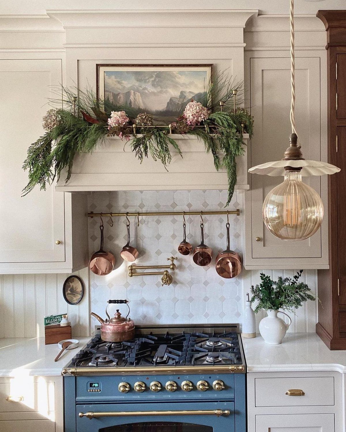 Blue Kitchen Appliances: 28 Ideas from Ranges to Kettles 2 Blue vintage kitchen range with gold knobs and copper pots hanging above it.