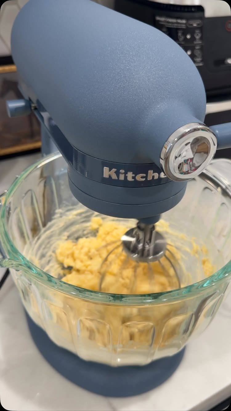 Blue Kitchen Appliances: 28 Ideas from Ranges to Kettles 8 Blue stand mixer with a glass bowl mixing yellow batter on a white counter