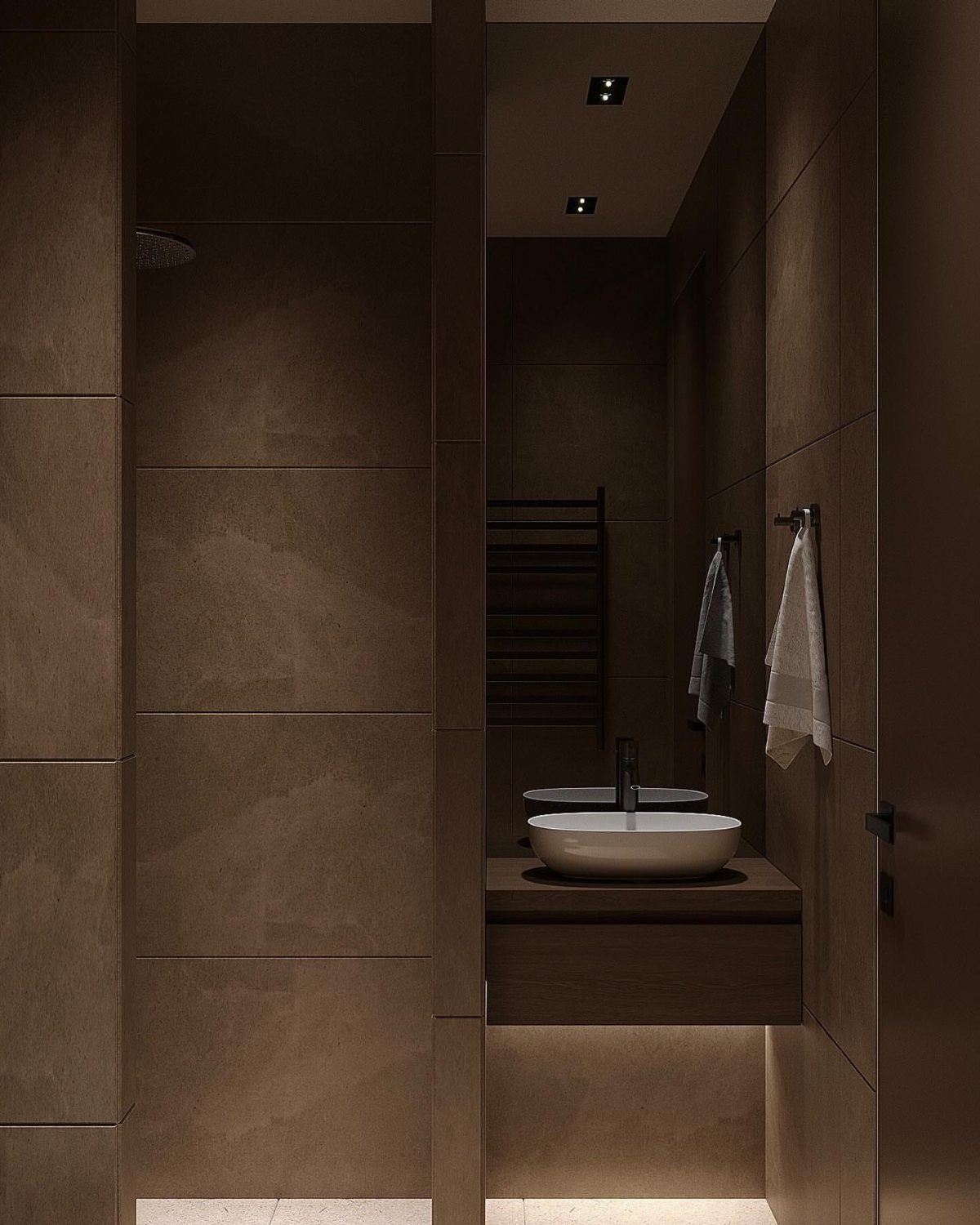 Dark brown floating bathroom vanity with white vessel sink and matching brown wall tiles.