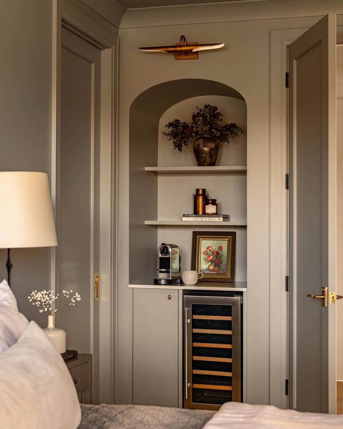16 Home Coffee Stand Ideas to Fit Any Space 8 Built-in grey arched coffee bar with wine cooler located inside a bedroom