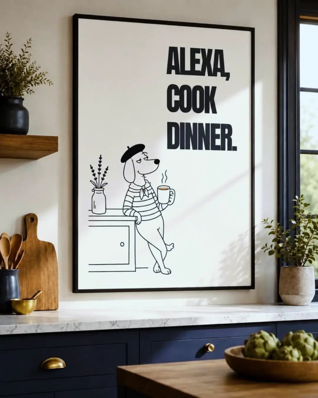 Framed cartoon dog print with text hanging on a kitchen wall above navy cabinets.
