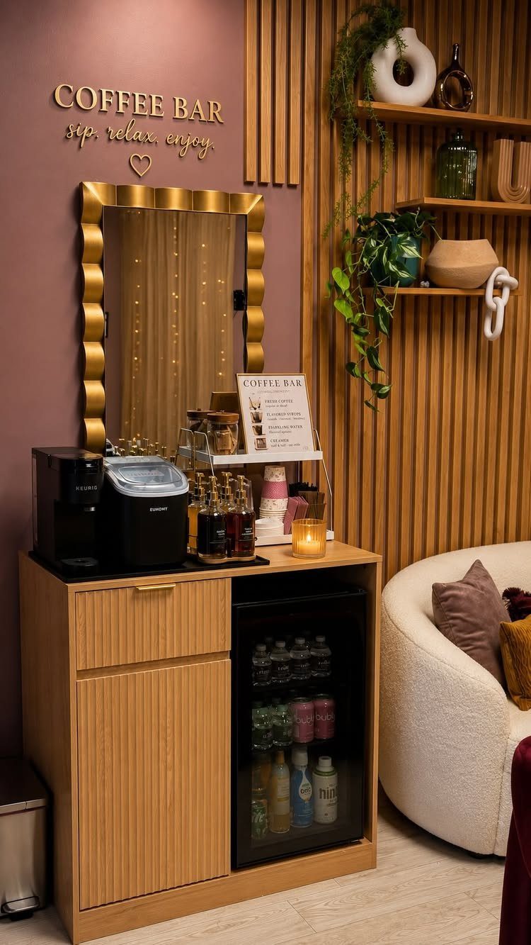 13 Mini Bar House Design Ideas to Fit Your Space and Taste 4 Wooden coffee station cabinet with a coffee machine, mini fridge, and gold mirror.