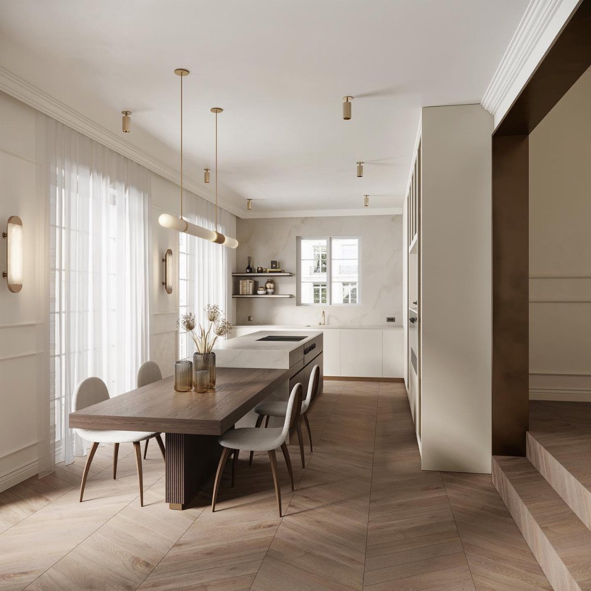 Modern white kitchen island extending into a dark wood dining table with grey chairs.