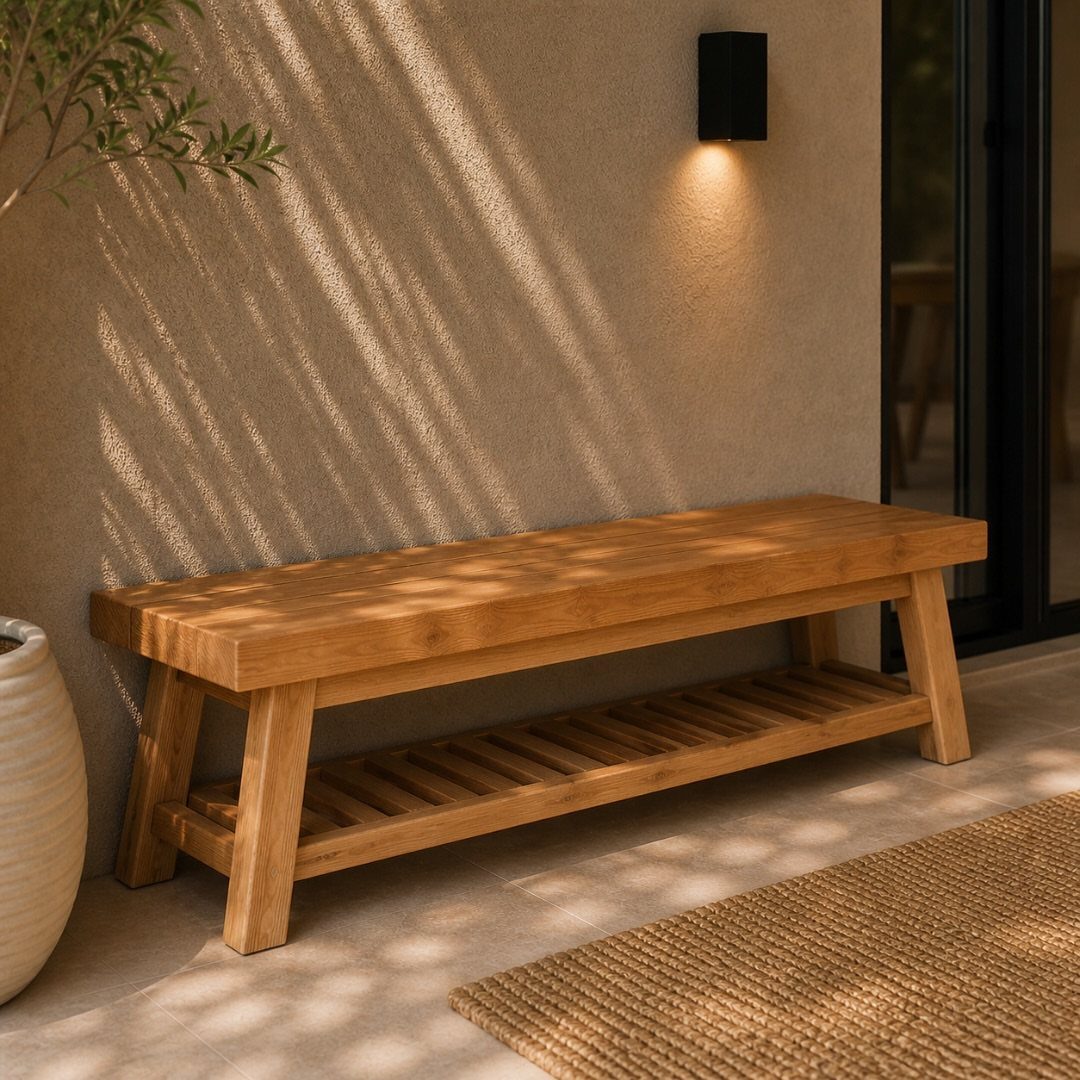 29 Scandinavian Outdoor Furniture for Patios and Gardens 20 Wooden outdoor bench with slatted shelf against a beige wall with warm lighting