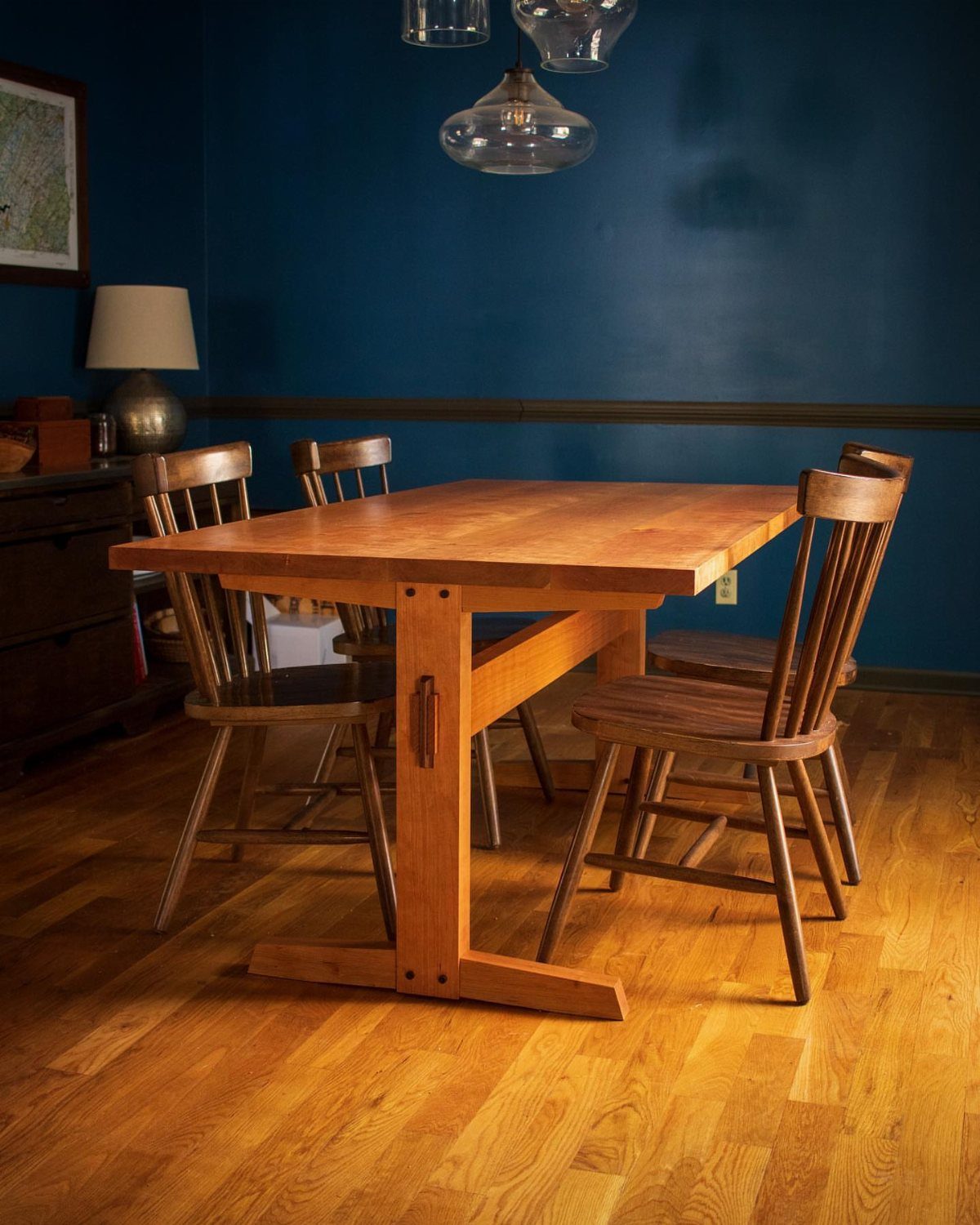 Solid Wood Dining Table Set: 20 Ideas for Your Home 8 Cherry wood dining table set with matching chairs in a blue room