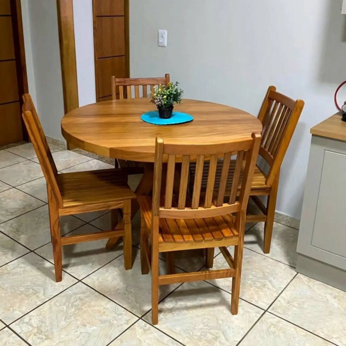 Solid Wood Dining Table Set: 20 Ideas for Your Home 3 Round solid wood dining table set with four matching slatted back chairs.